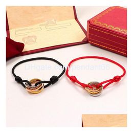 Bracelets de charme 23SS Mode en acier inoxydable Trinity Ring String Bracelet Trois anneaux Dragonne Couple pour femmes et hommes Jelry Famo Dhgtk
