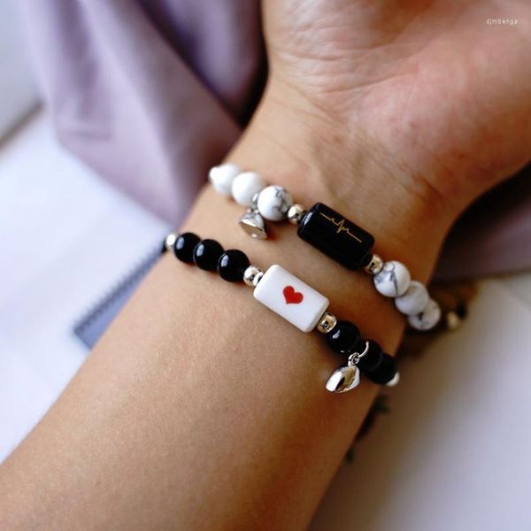 Bracelets porte-bonheur 2pcs / Set Heartbeat Céramique Pendentif Bracelet Aimants Attirer Les Amoureux Bijoux Cadeaux Corde Réglable Pour Femmes Et Hommes