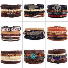 Bracelets de charme 4pcs / set boho gitan hippie en cuir noir corde de corde à aile feuilles boussole enveloppe empilable enveloppe unisexe faite à la main