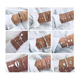 Bracelets De Charme 5 Pcs Géométrique Creux Électrique Carte Conque Combinaison Bracelet En Couches Ensemble Perlé Mtiple Bijoux Empilables Drop Delive Dhiuo