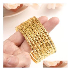 Pulseras de encanto 8 unids 68 mm de diámetro Mujeres grandes Dubai India Niñas Brazalete 24K Pulsera de color oro Africano Arabethiopian Novia Drop Deliv DH1XS