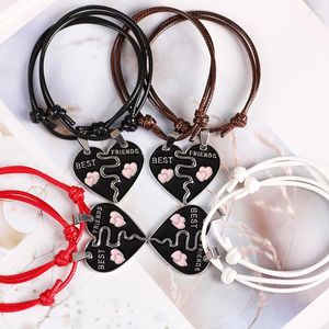 Bedelarmbanden Een paar Japan en Zuid -Korea Fashion Alloy Pendant vriend Peach Heart Splicing lederen koord gevlochten paar armbandcadeau