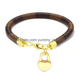 Charm Bracelets Bracelets de charme en cuir de marque pour femmes Plaid Pu véritable plaqué or coeur sac pendentif mousqueton conception bracelet Fashi Dh9B5