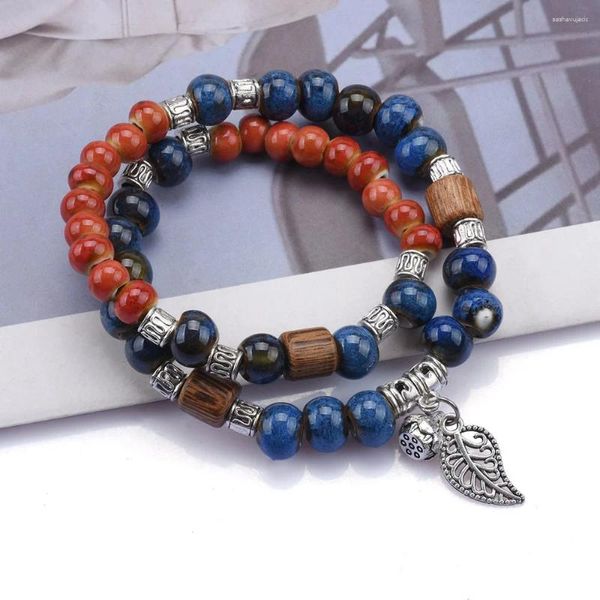 Bracelets de charme chinois en céramique perlée femmes Boho bracelet ethnique avec feuille de métal pendentif cloche bohème pour hommes cadeaux