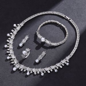 Bracelets de charme Collier de perles de zircone cubique Boucles d'oreilles Ensemble de 4 fêtes de mariage pour femmes Tous les zircons Dubai Ensemble de bijoux de mariée Cadeau 230901