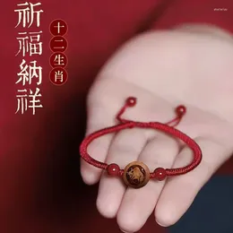 Bracelets de charme Dragon Année Zodiac Corde Rouge Bracelet Animal Pêche Bois Cinnabar Pit Mâle Et Femelle Meilleure Chance