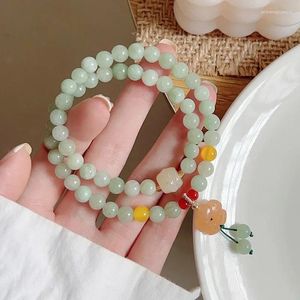 Bedelarmbanden elastische jade bloemenarmband met vintage en meerlaags kleurrijk steenontwerp Stijlvolle polsband met twee cirkels voor dames