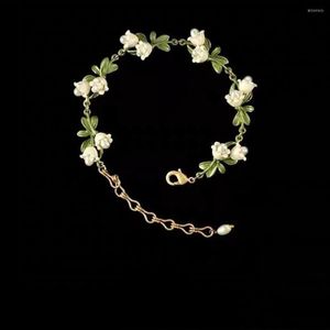 Bracelets porte-bonheur personnalité élégante blanc feuille florale alliage émail Lily Valley chaîne bracelet pour femmes bijoux féminins
