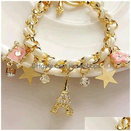 Bracelets de charme Bracelets de charme de mode pour femmes étoile d'or cristal tour Eiffel Poker fleur bracelet femme tressé en cuir corde manchette B Dhyhl