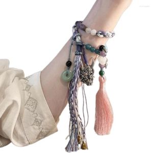 Bracelets de charme Bracelet de glands tissés à la main Cordes réglables Chaîne de poignet ethnique perlée Chaîne de poignet à la main Bijoux tibétains chinois