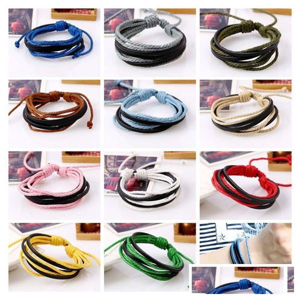 Pulseras con dijes Pulsera tejida a mano de cuero Estilo británico Joyas para hombres y mujeres Moda Versátil Leathe Fb066 Orden de mezcla 20 piezas Dhhyd