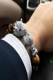 Bracelets de charme bracelet de pierre de pierre de tigre mcllroy hommes femmes femmes de luxe dragon fermoir perles faites des bijoux de mode.