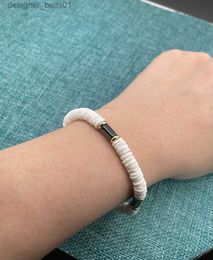 Bracelets de charme bracelet à coque blanche naturelle pour hommes et femmes Bracelet en acier inoxydable ou hématite pour le bracelet de perle cadeau pour hommes 231214