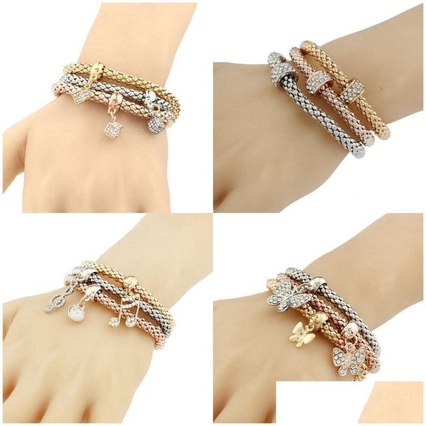 Bracelets De Charme Nouveaux Ensembles De Bracelet De Pop-Corn Trois Couleurs Bracelets Extensibles Cristal Strass Note De Musique Papillon Carré Entretoise Charmes F Dhwt5