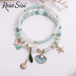 Bedelarmbanden roze sisi Koreaanse stijl zomer frisse student cadeau voor meisje oceaan shell zeemeermin schattige elastische armband dames juwelsecharm