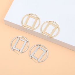 Charme Classic Simple Style F-Letter Designer Boucles d'oreilles Stud Bringle pour femmes Charme Cadeaux de mariage Bijoux Accessoire de haute qualité Y240429