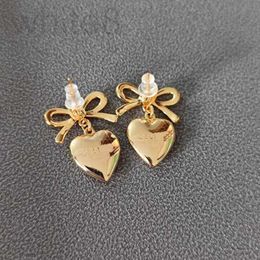 Charme Designer Celi New Love Boucles d'oreilles à arc Mesh rouge même style Gold Face brillant petit doux