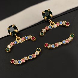 Charme Boucle d'oreille Loop Drop Designer Stud d'oreille 18K Boucles d'oreilles en cuivre plaquées Fashion Fashion Womens Brand LETTRE CRISTAL RHINESTONE PEARL FEMANDS BIJOURS PERFECT 2024