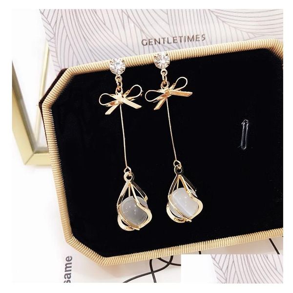 Charme Japon Et Corée Du Sud New Bow Opal Boucles D'oreilles Simple Versatile Hipster Drop Long Style Tempérament Oreille Clip Femme En Gros Deliv Dhngp