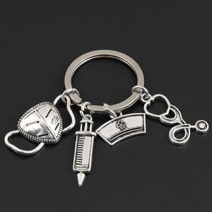 Porte-clés à breloques Dispositif d'injection Porte-clés Masque Infirmière Cap Ambulance Médecin Cadeau Porte-clés amical
