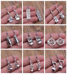 Charme Boucles d'oreilles bijoux musicales Note de musique microphone Drum Guitare violon en forme de boucles d'oreilles en forme de brossage pour filles 8790721