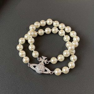 Charme Westwood Double couches Pearl Saturn Magnetic Budle Bracelet Womens Classic Full Diamond Planet Nail