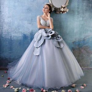 Affascinante 2016 Dusty Blue 3D Floral Tulle Princess Ball Gowns Abiti Quinceanera Modest Manica corta Perle Lungo Prom Sweet 16 Dress EN11014