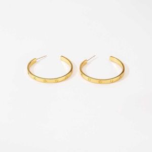 Boucles d'oreilles charmantes avec design de diamant à la mode géométrique Circulaire Cool Style 18K pour les femmes avec une boucle d'oreille originale de chariot