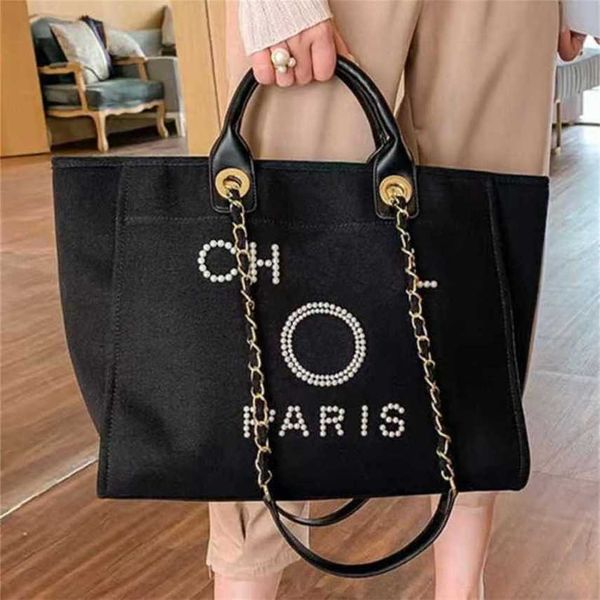 Pas cher 80% de réduction sur les sacs à main de luxe pour femmes classiques Sac de plage en toile Fourre-tout Sacs à main Mode Femme Grande capacité Petits paquets de chaîne Grand sac à main à bandoulière 2R7Q code 561