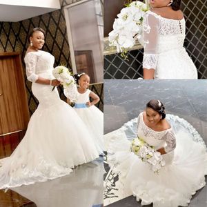 Robes de mariée africaines 2019 Taille Taille Half à manches Dentelle Approche de dentelle Date d'épaule Sirène Robes de mariée Cookeed Bouton Covereed Robes de mariée sur mesure