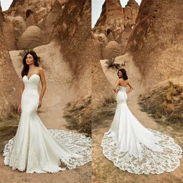 Goedkope zeemeermin trouwjurken strapless mouwloze geappliceerd kant boho bruidsjurk sexy backless sweep trein strand gewaden de Mariée