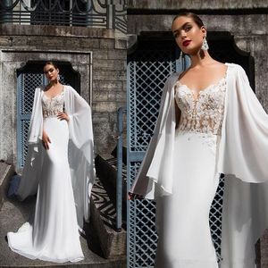 2020 Robes de mariée sirène sexy à col transparent avec des appliques de cape longues couvertes de boutons au dos du château robe de mariée illusion robe de mariée 2060