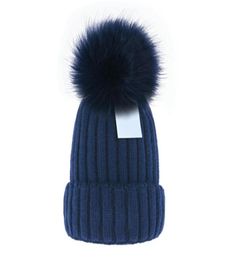 Bonnet entier pas cher Nouveaux bonnets d'hiver Chapeaux tricotés Bonnet femme Épaissir Bonnets avec de vrais pompons en fourrure de raton laveur Bonnets chauds pour filles pomp75025206579