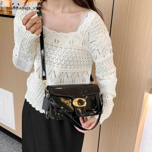 Barato Venta al por mayor Bolsos de diseñador Moda Nuevo Bolso de un solo hombro Cara brillante Inicio Marca de moda Axila Crossbody Avanzado Simple Popular Bolso para mujer