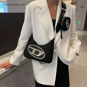 Barato Venta al por mayor Liquidación limitada 50% de descuento Bolso Dingdang Bolso Nuevo Alta calidad Un solo hombro Pequeño Tela Oxford Correa ancha Hobo para mujer