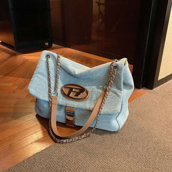 Barato Venta al por mayor Liquidación limitada 50% de descuento Bolso de mano Versátil de moda Un hombro Bolso de mano para mujer Nuevo Bolso de cadena de gran capacidad minimalista y digno