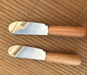 Couteau de fromage couteau à beurre en acier inoxydable avec manche en bois spatule beurre en bois de beurre de bois de jeu de bouton de jeu de confiture GGA2601935998