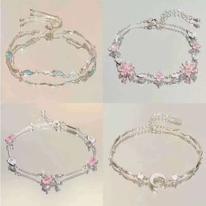 Bracelet nœud en fleurs de cerisier petite pierre de zircone rose haut de gamme, sensation claire et froide, artisanat meilleur ami, bracelet tendance