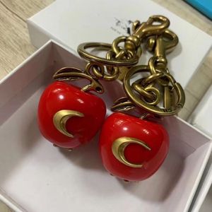 Kerskleurige sleutelhanger C sleutelhanger Fruit rode appel Wr onderdelen hanger Fashio letter sleutelhanger Cadeau voor Fruit Girl