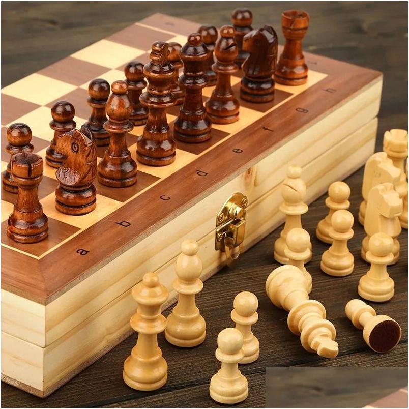 Jeux d'échecs jeu de pliage en bois magnétique ensemble de jeux feuttant 24cm24cm intérieur rangement adt kids gift family 231020 gouttes livraison sports dhxp0