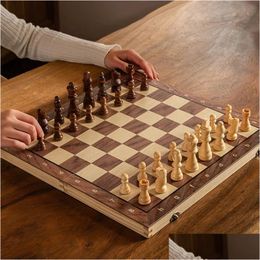 Jeux d'échecs Set magnétique pliable portable planche en bois massif éducatif pour les étudiants et les enfants cadeau de Noël 231121 Drop Delivery Spor Dhtiw