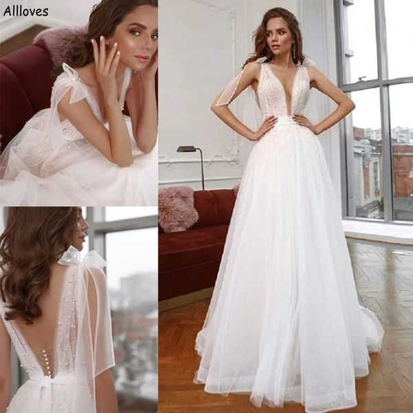 Elegantes correas de lazo Perlas Una línea Vestidos de novia Romántico Tul Cuello en V Vestidos de novia sexy Boho Garden Tren de barrido Tallas grandes Sin espalda Recepción Novia Robes de Mariee YD