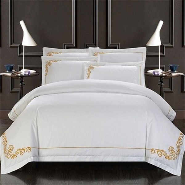 Juego de funda nórdica bordada elegante 4/6 piezas Juego de cama de hotel blanco King Queen Size Ropa de cama suave de lujo Sábana Fundas de almohada T200822