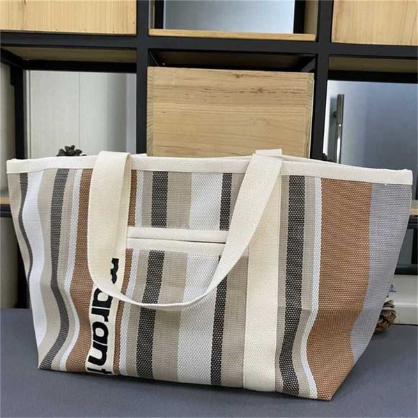 Bolsos de hombro elegantes Bolso tejido de hierba Bolso de ocio Bolsos de diseñador Tote Bolso de compras de rayas coloridas 240311