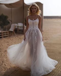 Correa de espagueti elegante A Línea Vestidos de novia Illusión Apliques de encaje de vestidos de novia bohemio