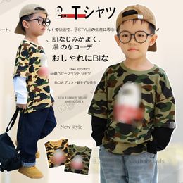 Enfants Camouflage T-shirt Boys Cartoon Letter Imprimé à manches longues Faux Toi de deux pièces 2024 Été Kids Designer Clothing Z7515