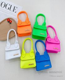 Niños Bolsos de color fluorescente Candy Candy Colorido PU Cuero bolsillo para un solo hombro Metales para niños Aplique Messenger Bols9929014