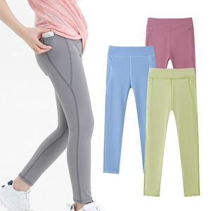 Niños Leggaciones sólidas para niños Pantalones de yoga elásticos Spring Otoño Entrenamiento Sports Gimnasio Biratenante Candy Camish