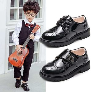 Children's 2024 Spring Boys Black Dance Small Leather Britse stijl Baby School Bloem Kinderen Performance schoenen