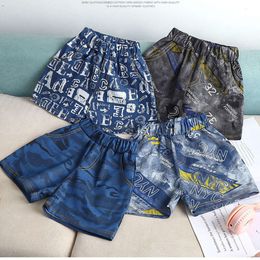 Enfants Summer 2024 Pantalon de mode pour enfants Denim Boys pantalons filles shorts de plage de plage